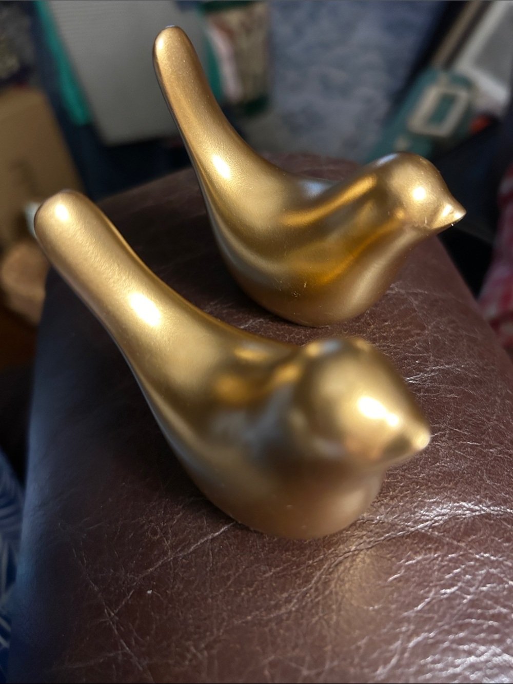 Precious little set of heavy gold-tone birds.
They are heavy like brass,